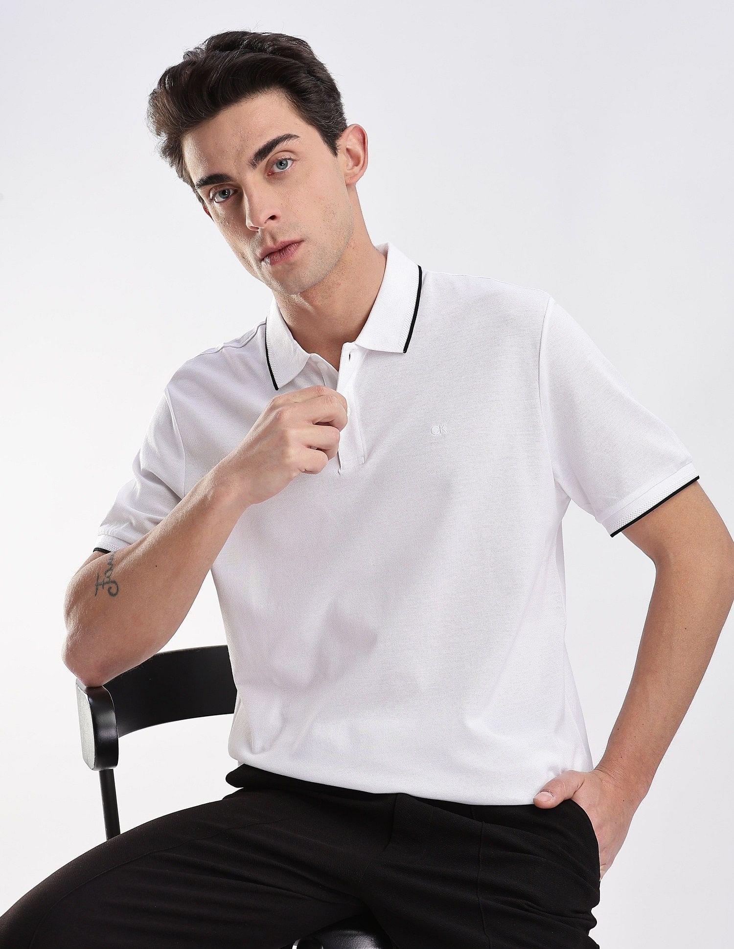 Calvin Klein Jeans Regular-Fit Solid Cotton Polo Shirt
