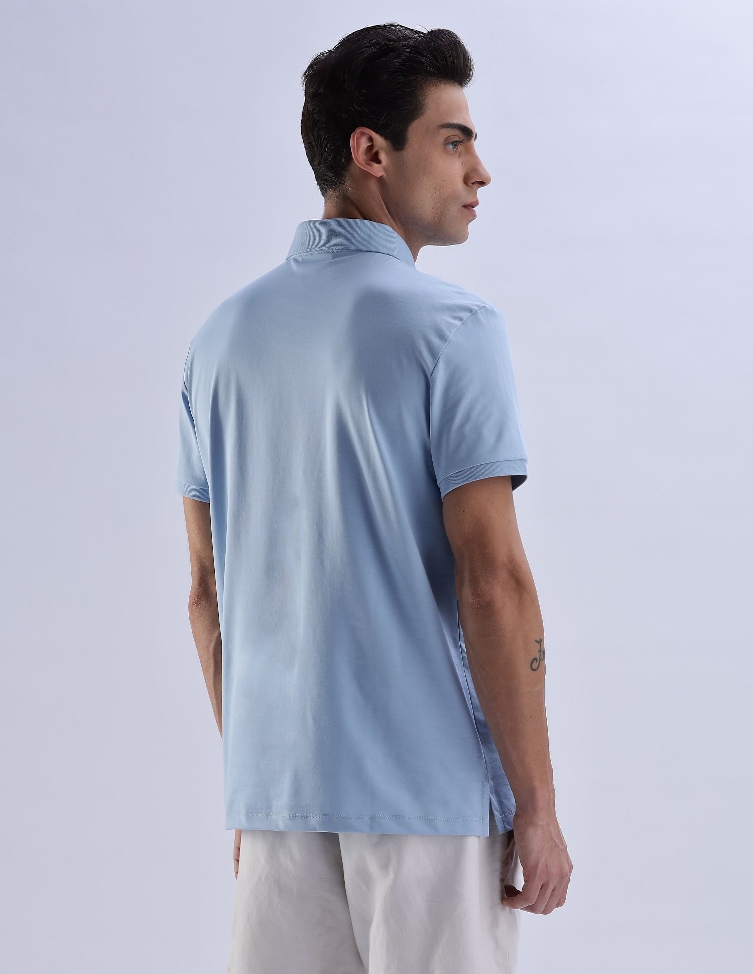 Calvin Klein Jeans Regular-Fit Solid Cotton Polo Shirt