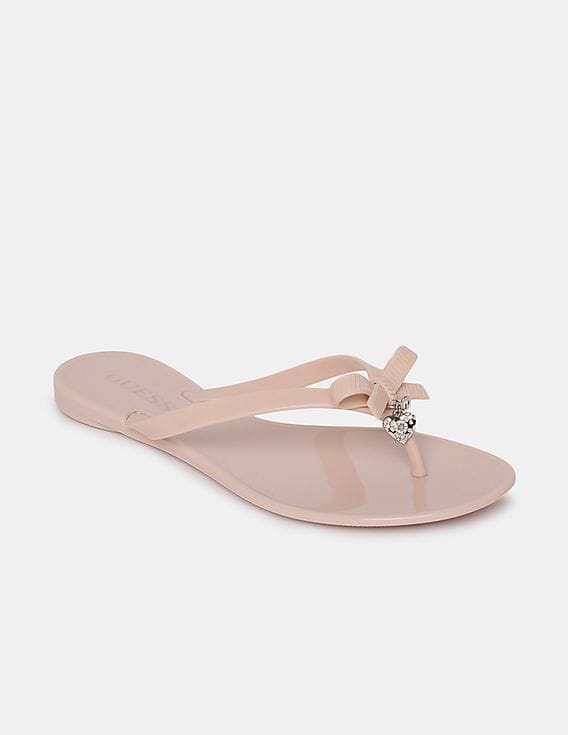 guess rose gold flip flops