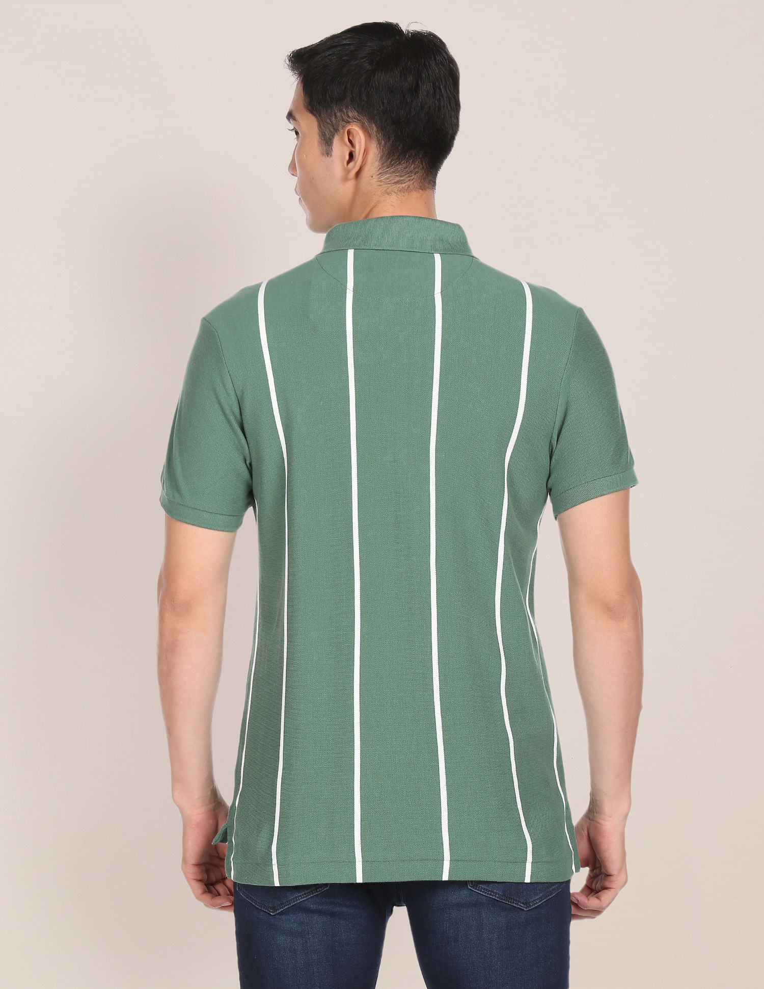 Green and white shop vertical striped polo shirt