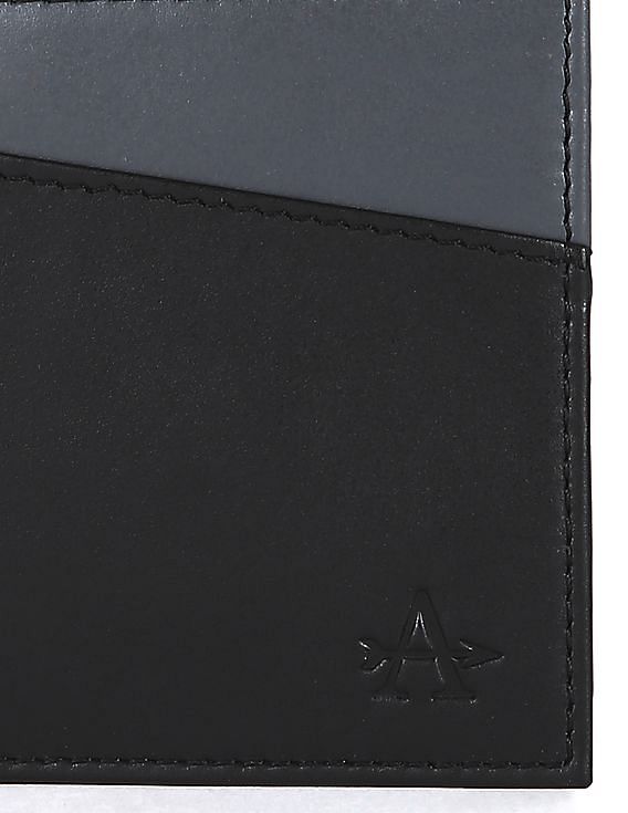 Louis Vuitton Dark Brown Leather Monogram Embossed Bifold Wallet
