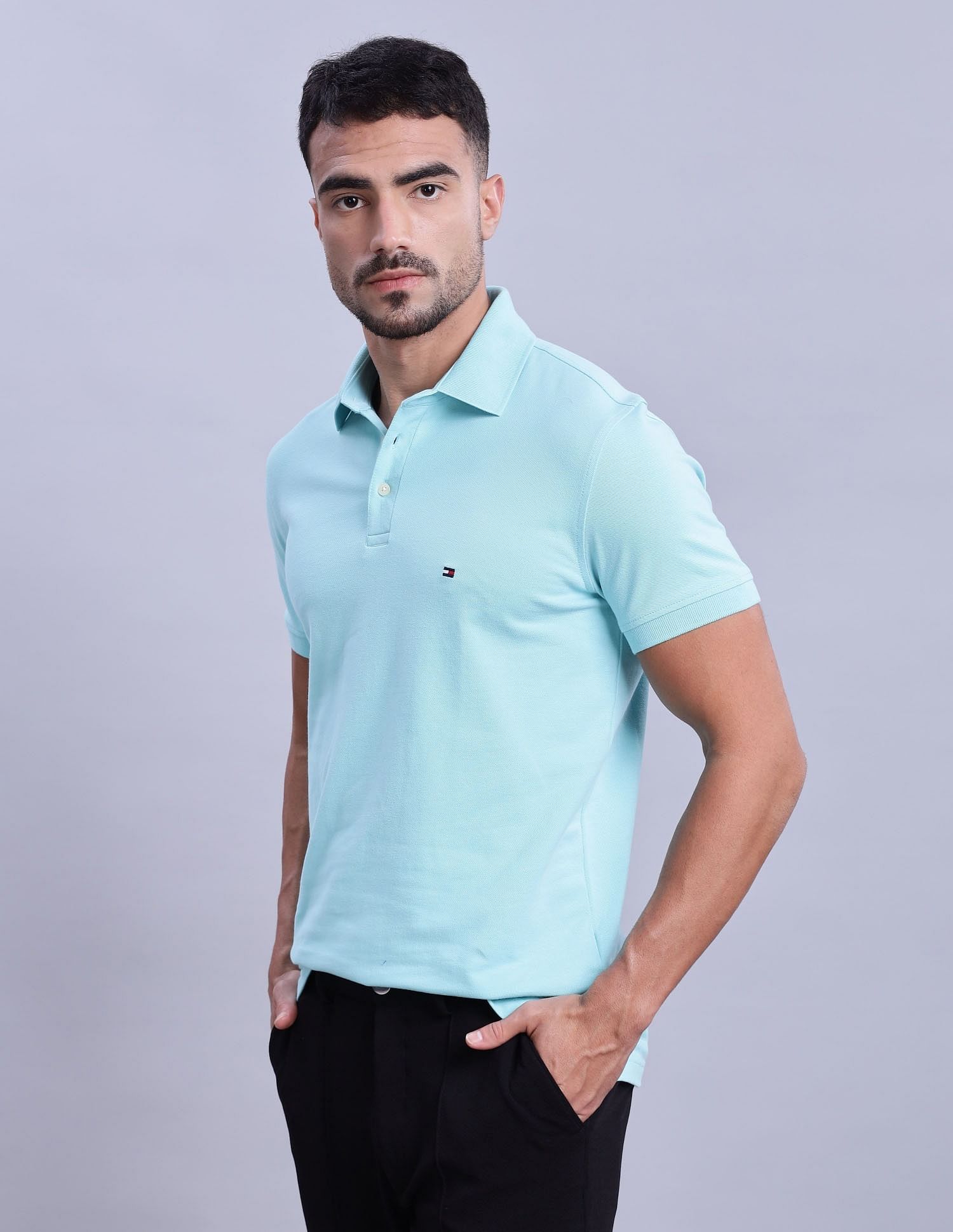 Tommy Hilfiger Mens Blue Solid Polo Shirt