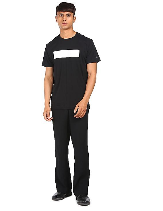 Buy Calvin Klein Men Black Crew Neck Embossed Logo Cotton T-Shirt -  NNNOW.com