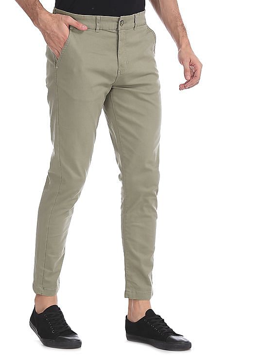 Buy Men Green Solid Cotton Stretch Trousers online at NNNOW.com