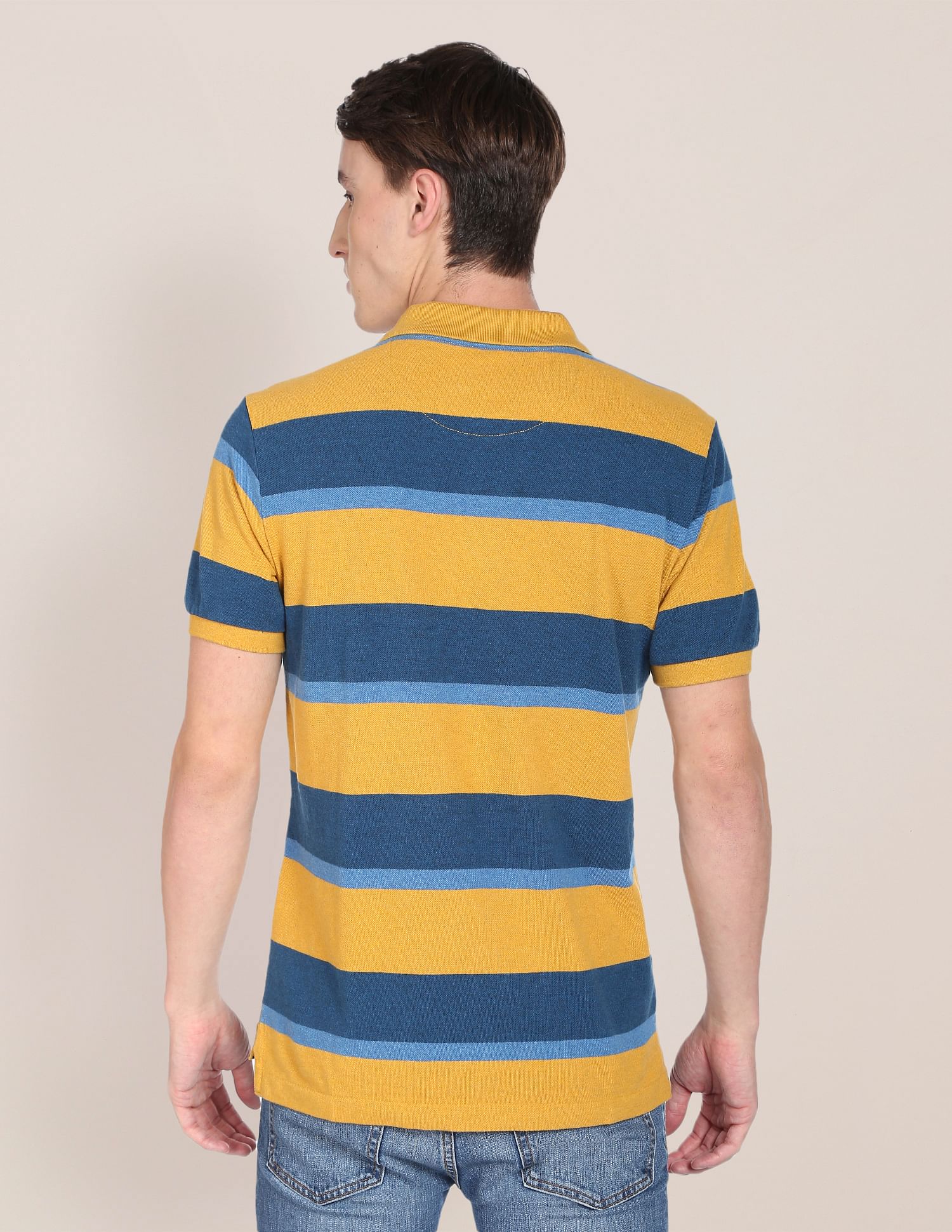 yellow striped polo