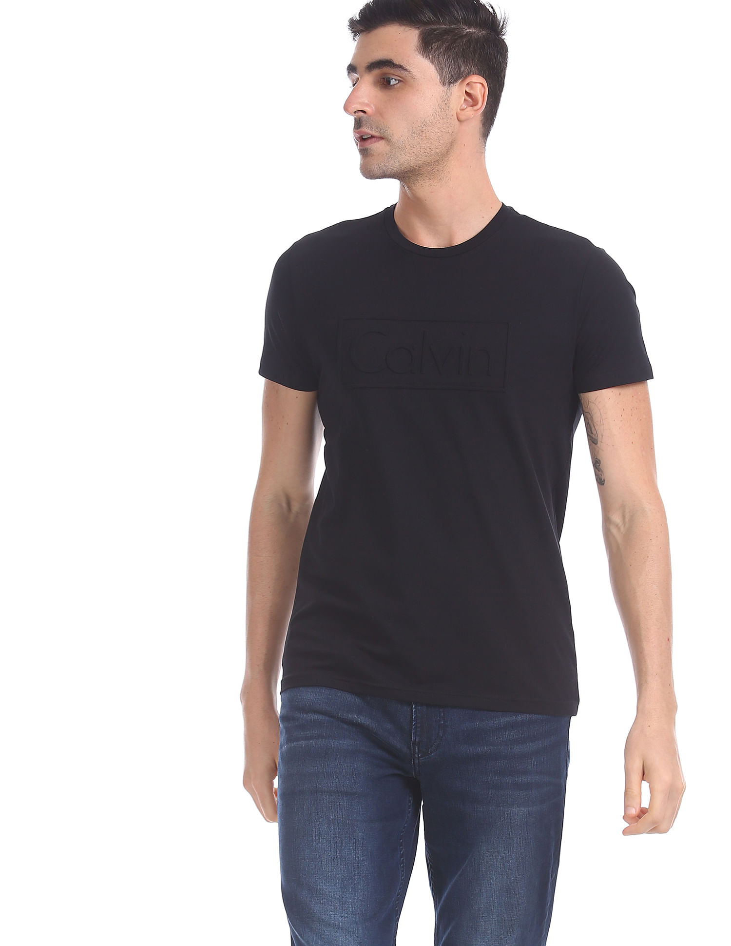 Buy Calvin Klein Men Black Crew Neck Embossed Logo Cotton T-Shirt -  NNNOW.com