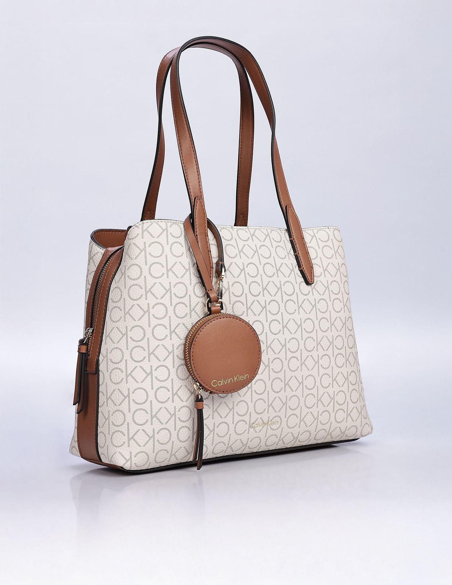 Calvin Klein Printed Beige Pvc Hand Bags