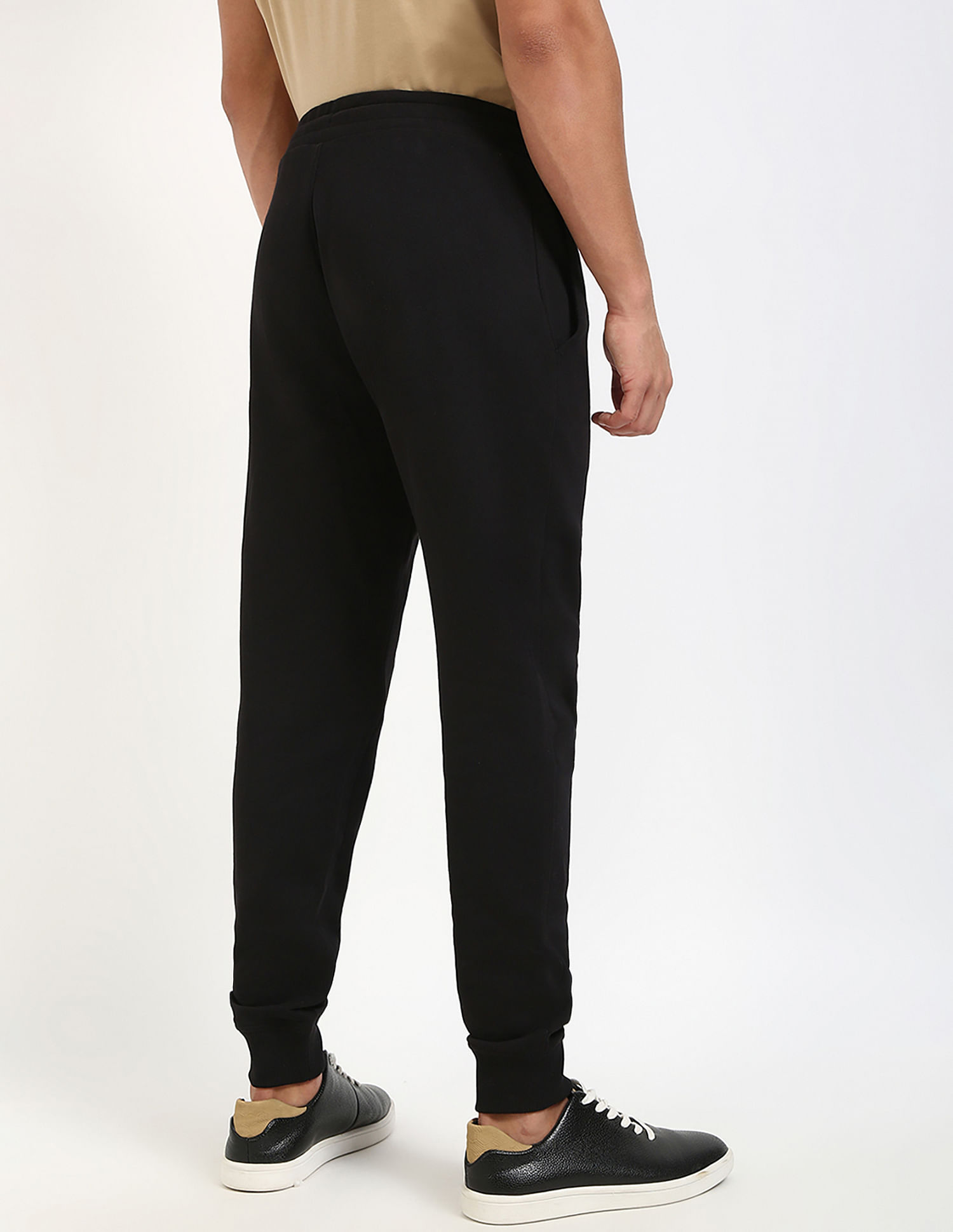 Calvin Klein Jeans Regular-Fit Solid Mid Rise Trouser