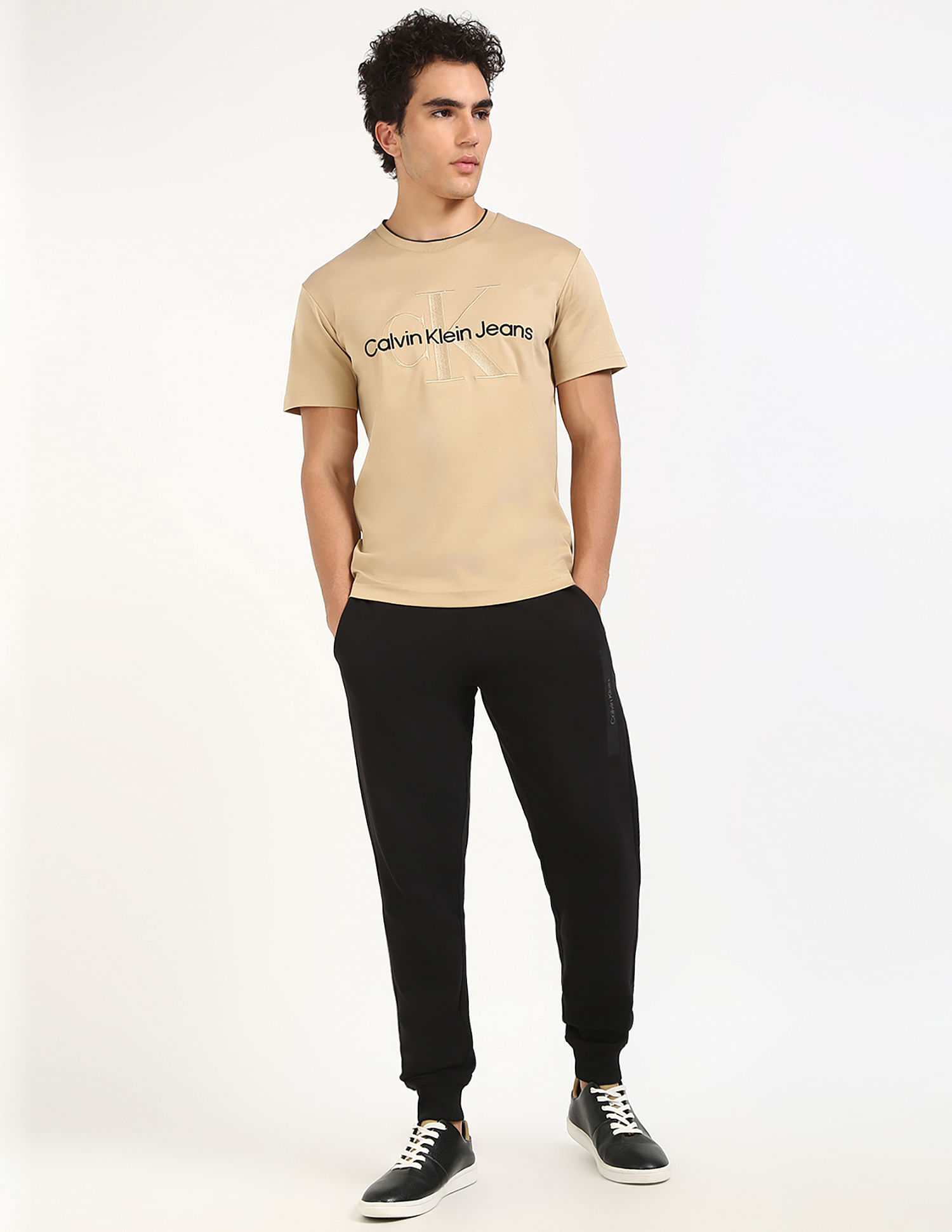 Calvin Klein Jeans Regular-Fit Solid Mid Rise Trouser
