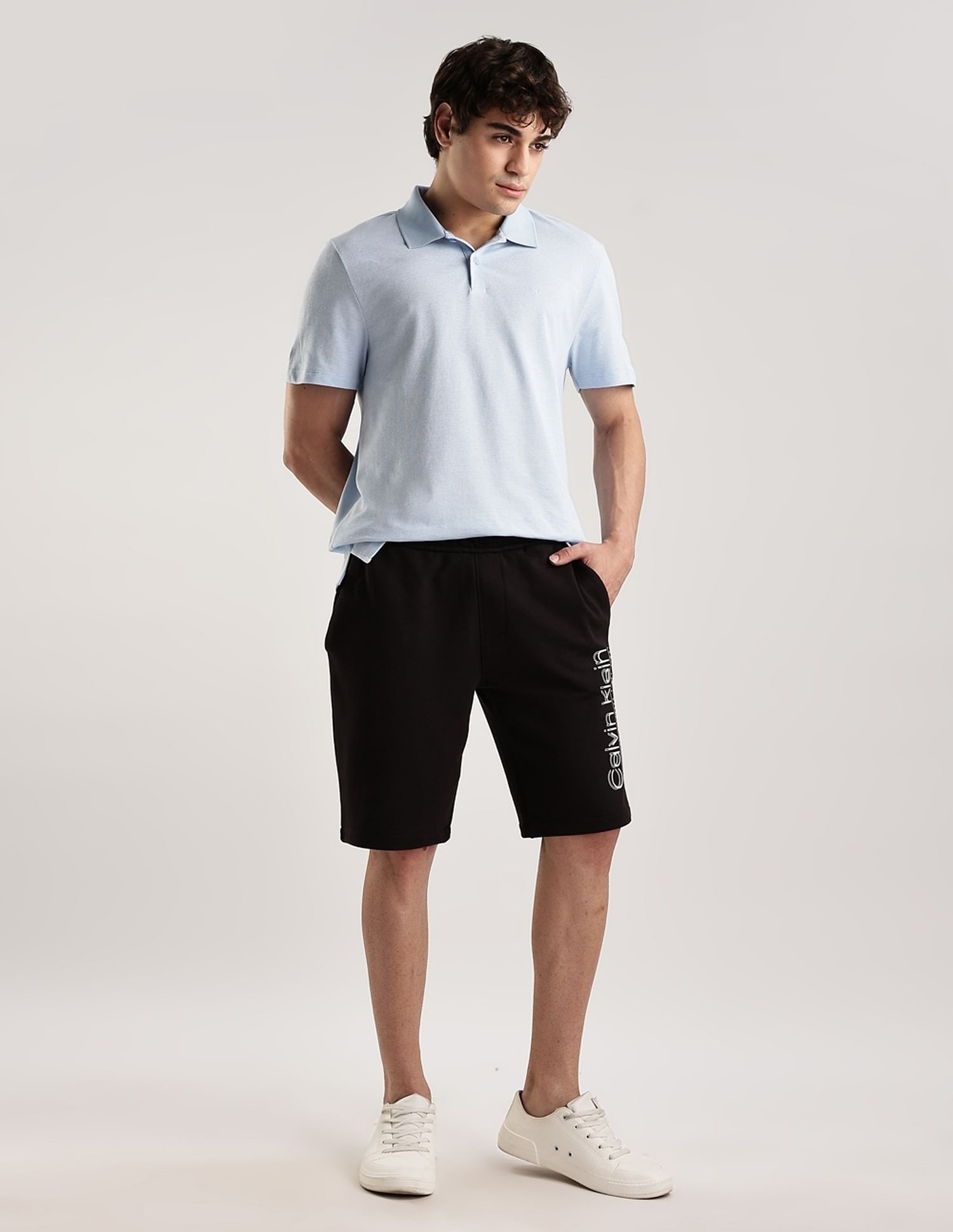 Calvin Klein Jeans Solid Regular-Fit Cotton Polo T-Shirt