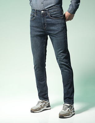 Dark-wash tapered-fit jeans