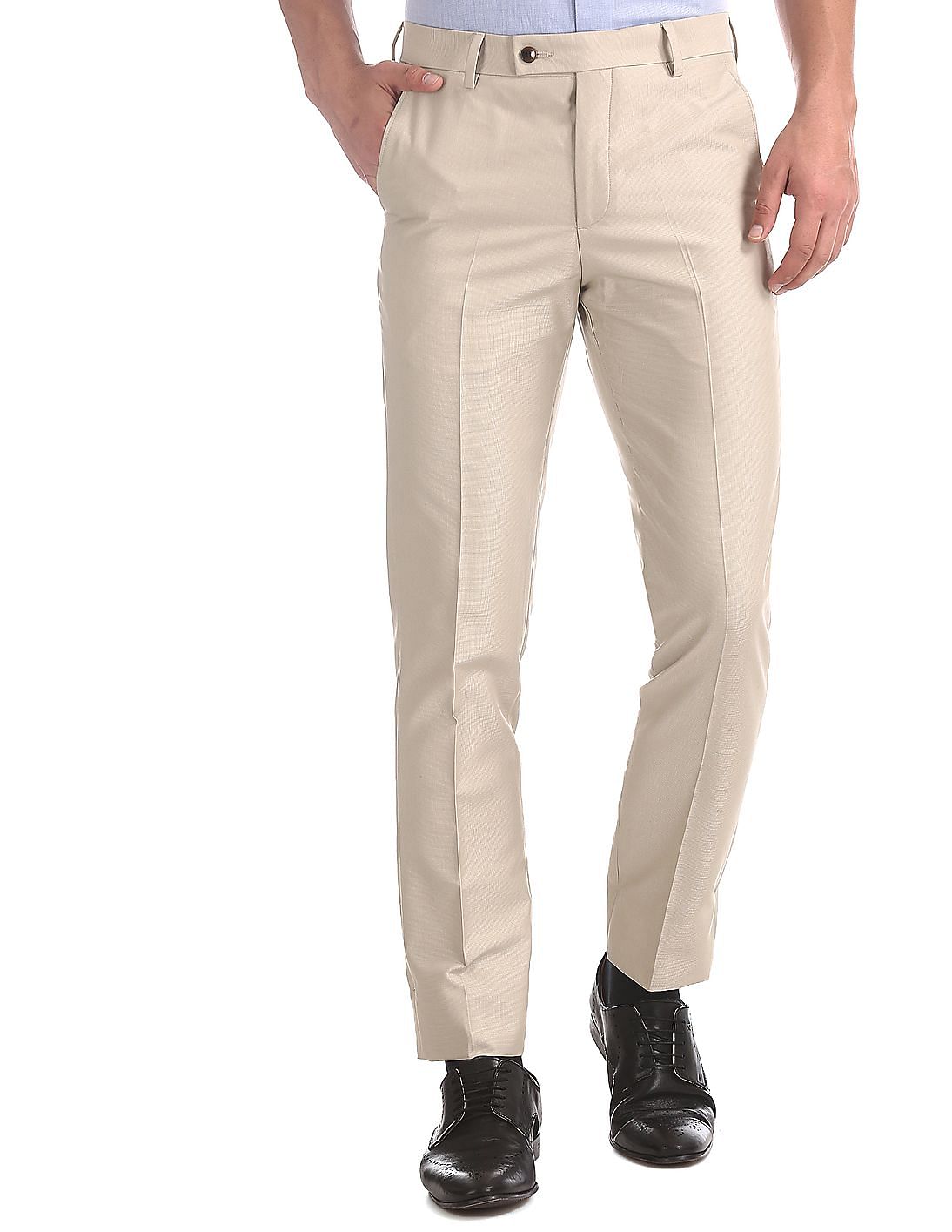 Buy Men Beige Mid Waist Solid Trousers Online At