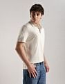 Calvin Klein Jeans Solid Regular-Fit Cotton Polo T-Shirt