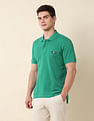 U.S. Polo Assn. Men Teal Short Sleeve Solid Pique Polo Shirt