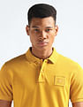 Flying Machine Logo Badge Solid Polo Shirt