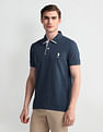 U.S. Polo Assn. Denim Co. Muscle Fit Solid Polo Shirt