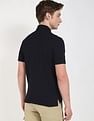 Tommy Hilfiger Solid Regular-Fit Cotton Polo Shirt