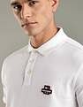 Tommy Hilfiger Solid Regular-Fit Cotton Polo Shirt