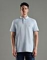 Tommy Hilfiger Solid Regular Fit Cotton Polo T-Shirt