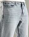 Tommy Hilfiger Heavy-Wash Slim Fit Mid Rise Jeans