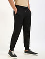 Calvin Klein Jeans Regular-Fit Solid Mid Rise Trouser